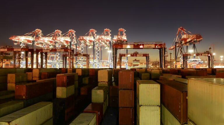 Import-export terminal port with cranes and containers