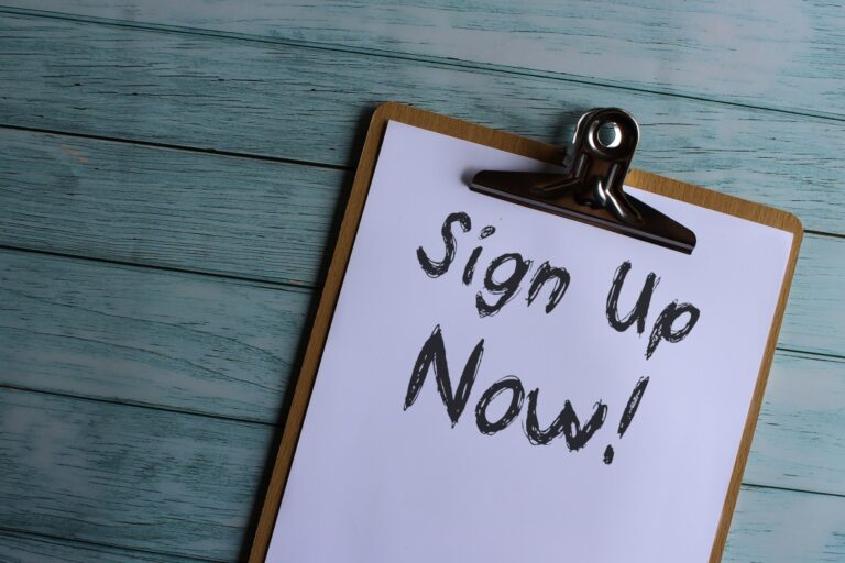 Paper clipboard with text Sign Up Now!